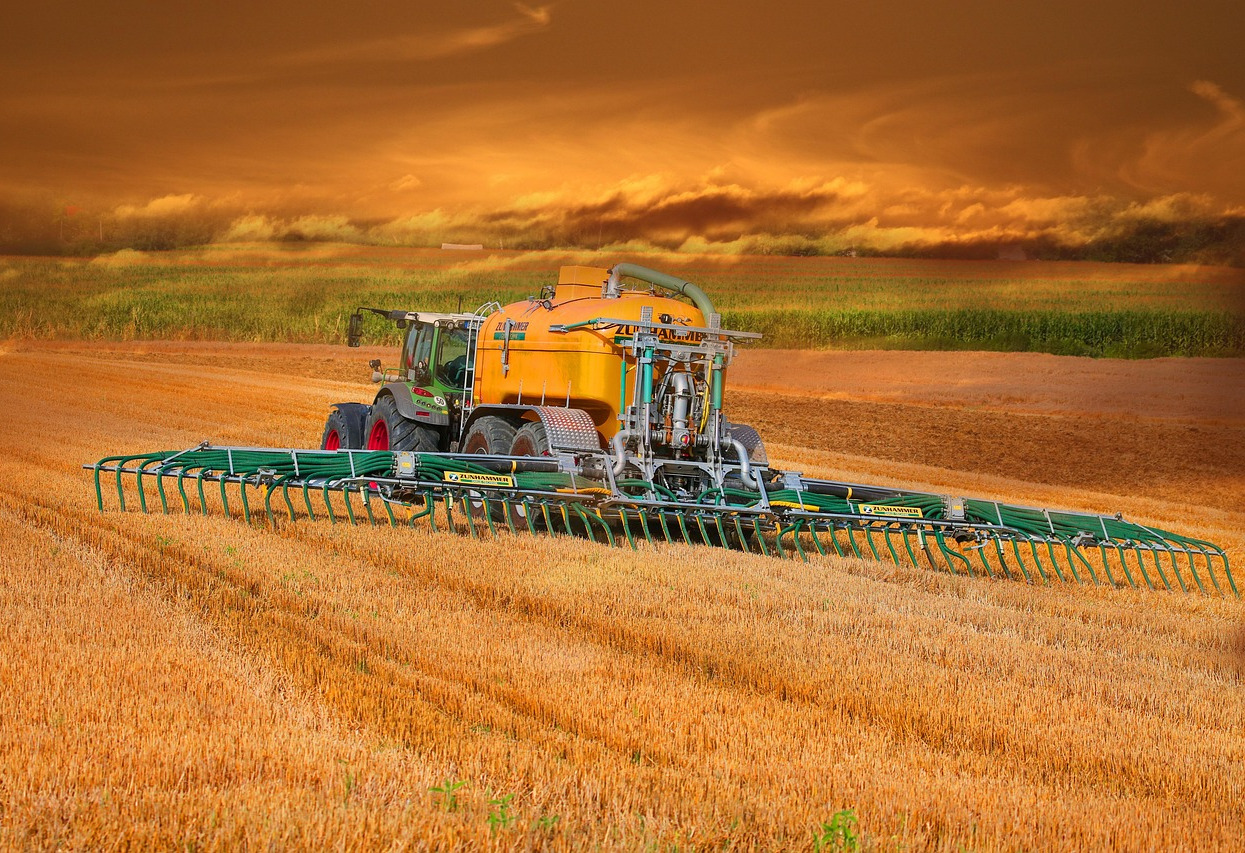 tractor and implements on farmland